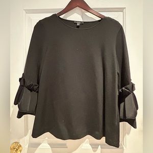 COS black scuba top with accent sleeves, trapeze fit. Neoprene fabric.